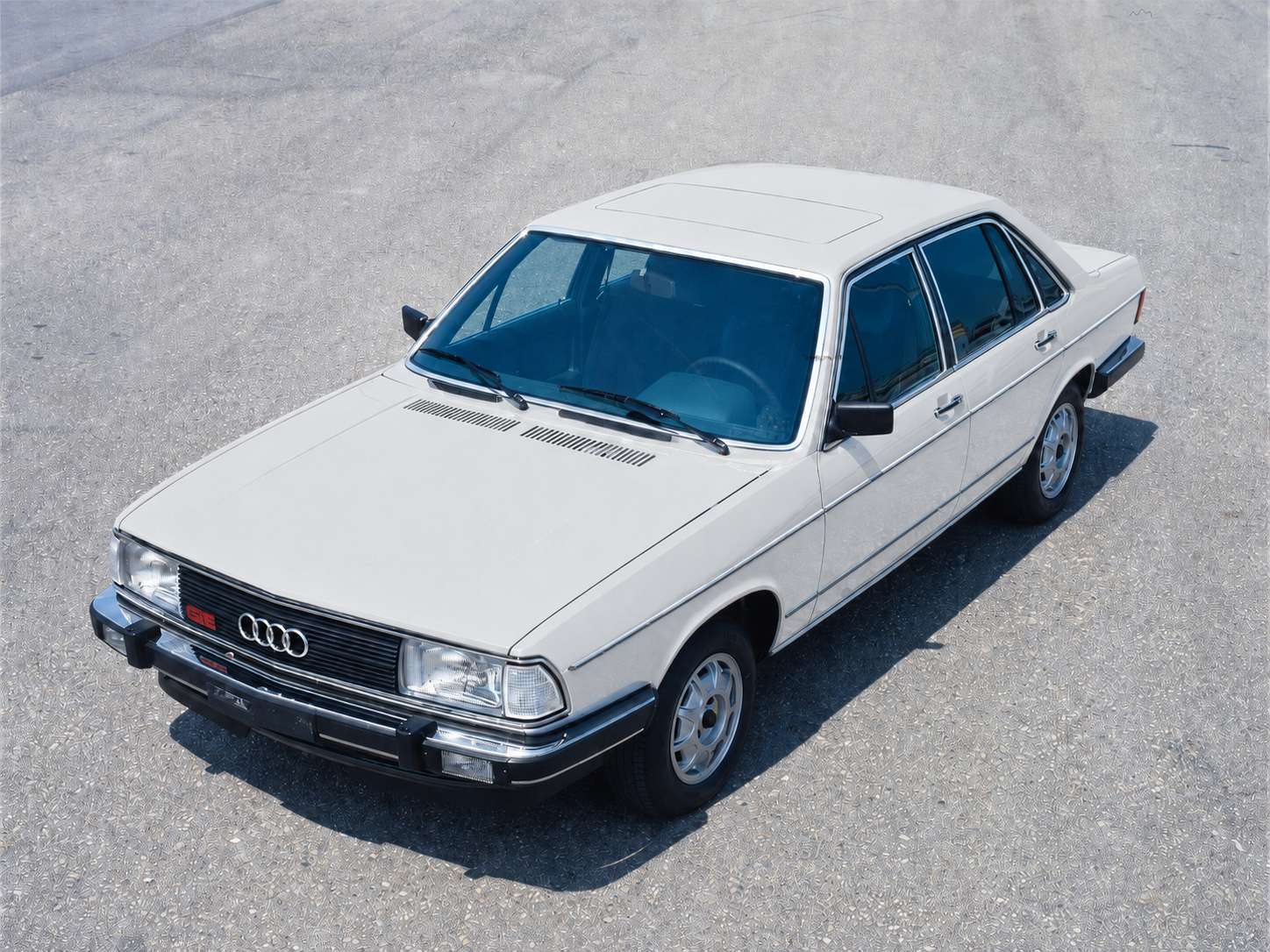Audi 100 C2 in profile, clean, rectangular, substantial, the shape of a car that expects to be taken seriously