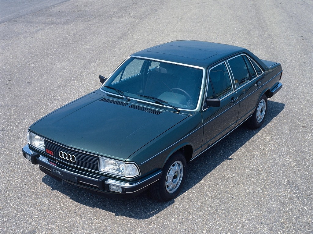 Audi 100 C2 in profile, clean, rectangular, substantial, the shape of a car that expects to be taken seriously