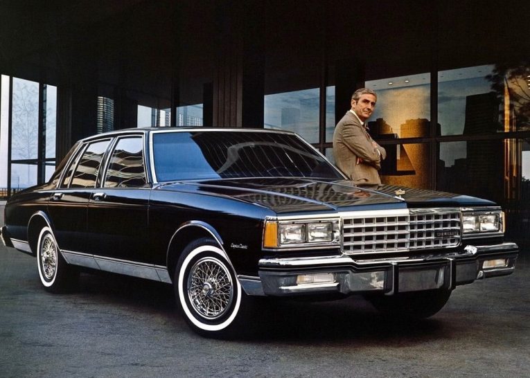 1977 Chevrolet Caprice in side profile, enormous, flat, boxy, the proportions of a car that has decided it is large and is comfortable with that