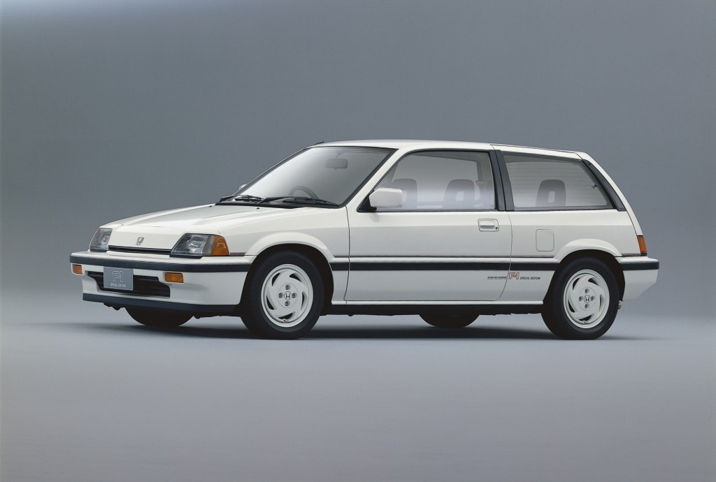 3rd generation Honda Civic hatchback, compact, refined, clean lines, the shape of something that has thought about itself