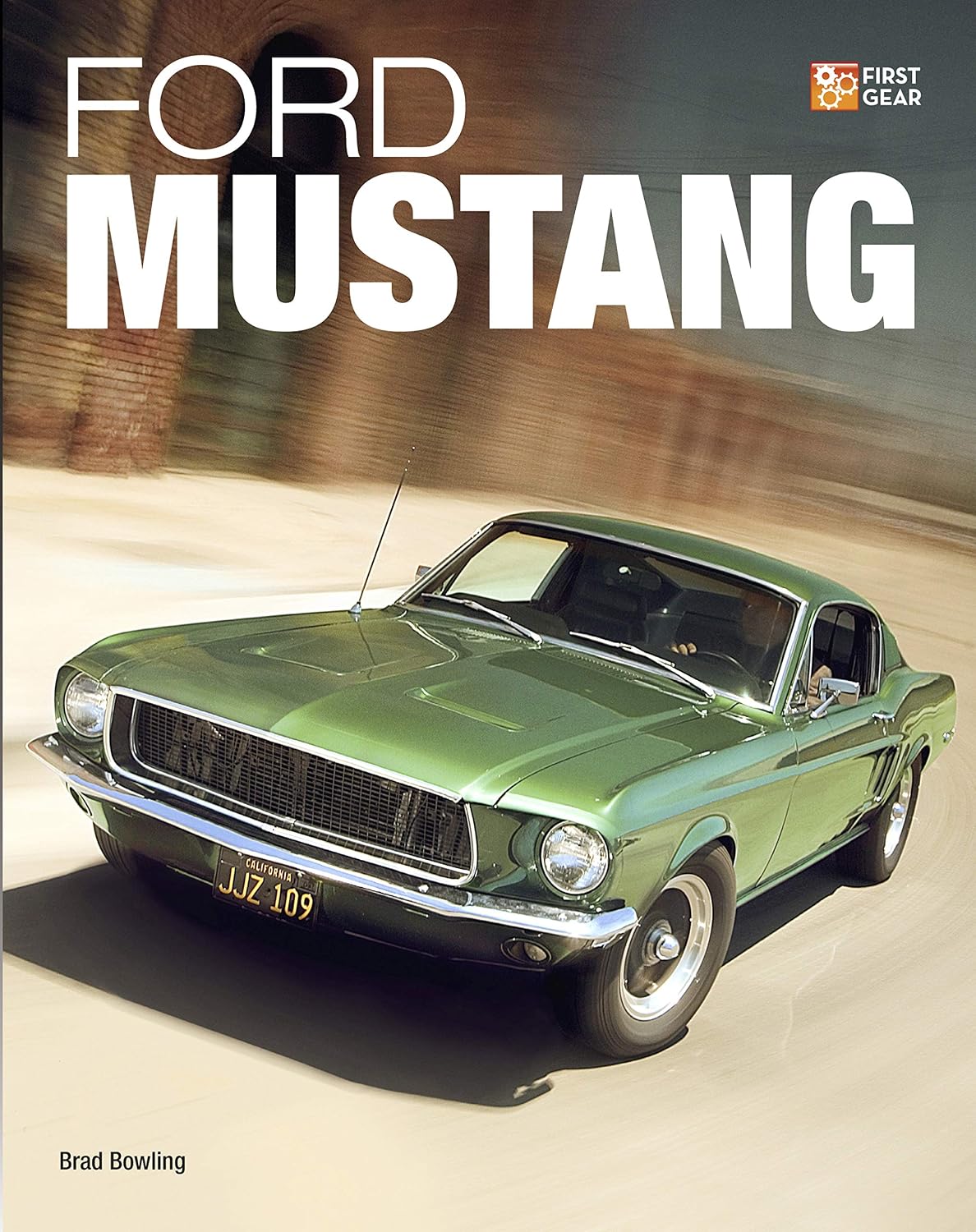 1968 Ford Mustang fastback in profile, long hood, short deck, the roofline sweeping back in a single unbroken line