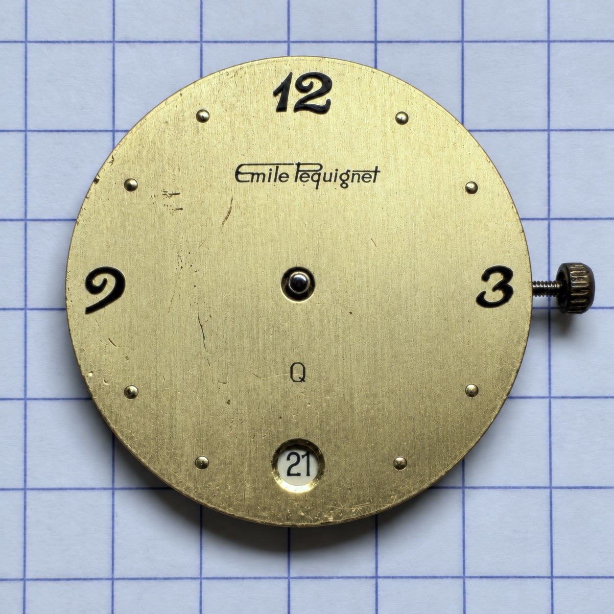 Emile Pequignet watch dial, showing scratches across the surface and missing hands — the condition after the 1996 service